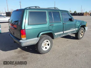 2001 Jeep Cherokee Sport with VIN 1J4FF48S81L591128, listed as a IAAI auction lot 42015092 with 274,638 mi miles. Bid and sale history available at carsss.com. Image 4.