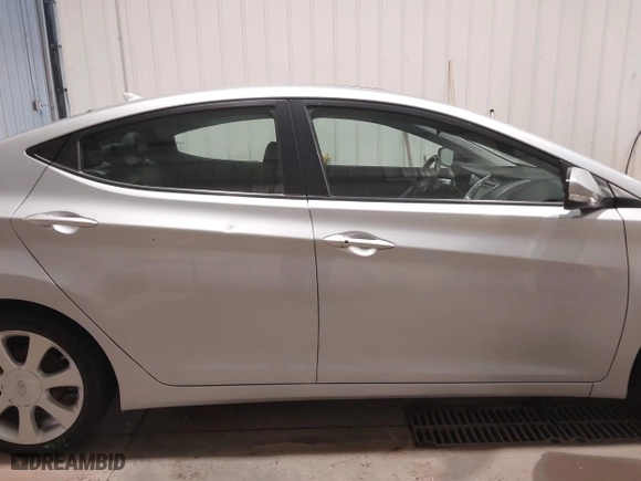 2012 Hyundai Elantra GLS with VIN 5NPDH4AE8CH100012, listed as a IAAI auction lot 40133634 with 82,423 mi miles. Bid and sale history available at carsss.com. Image 13.