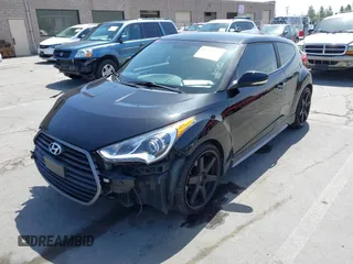 2016 Hyundai Veloster Turbo с VIN KMHTC6AE2GU288538, выставлен на аукционе IAAI как лот 42282122 с пробегом 83 231 миль миль и . История ставок и продаж доступна на DreamBid. Изображение 18.