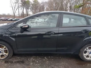 2015 Ford Fiesta SE with VIN 3FADP4EJ9FM175123, listed as a IAAI auction lot 41948452 with 130,801 mi miles. Bid and sale history available at carsss.com. Image 14.
