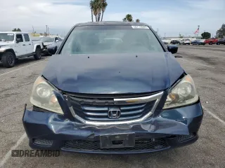 2010 Honda Odyssey EX with VIN 5FNRL3H46AB105054, listed as a Copart auction lot 56710665 with 118,156 mi miles and Salvage title. Bid and sale history available at DreamBid. Image 5.
