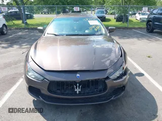 2015 Maserati Ghibli S Q4 with VIN ZAM57RTA7F1154097, listed as a IAAI auction lot 42568564 with 113,436 mi miles and . Bid and sale history available at DreamBid. Image 6.