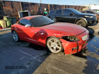 2011 BMW Z4 sDrive35is with VIN WBALM1C54BE393857, listed as a Copart auction lot 72769234 with 88,986 mi miles and Salvage Title. Bid and sale history available at carsss.com. Image 4.