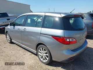 2012 Mazda Mazda5 Grand Touring with VIN JM1CW2DL2C0129518, listed as a IAAI auction lot 41872136 with 129,323 mi miles. Bid and sale history available at carsss.com. Image 3.