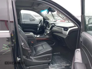2015 GMC Yukon XL SLT with VIN 1GKS2HKC6FR746809, listed as a IAAI auction lot 41559570 with 144,401 mi miles. Bid and sale history available at carsss.com. Image 5.