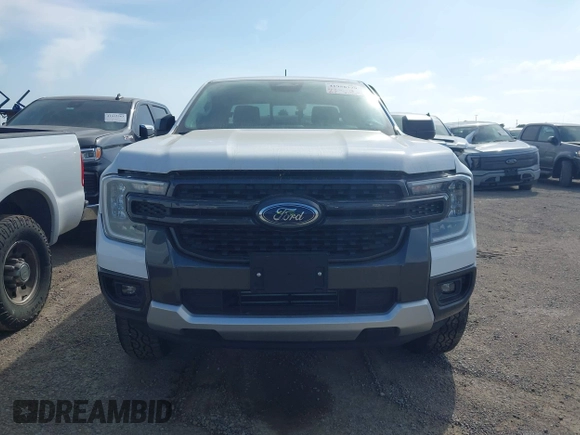 2024 Ford Ranger XLT with VIN 1FTER4GH1RLE26029, listed as a IAAI auction lot 41958379 with 9,716 mi miles and . Bid and sale history available at DreamBid. Image 12.