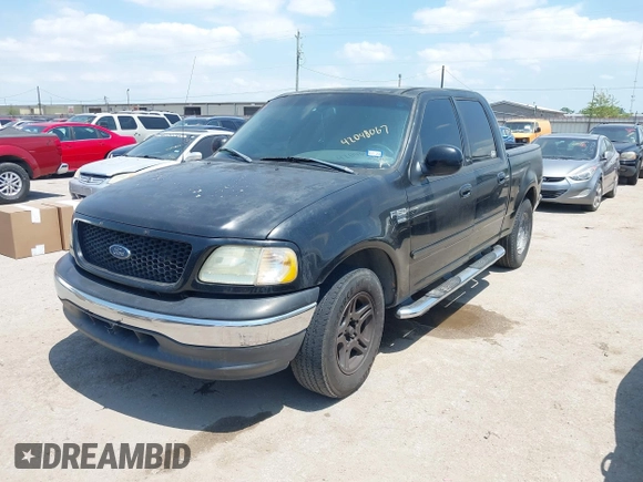 2002 Ford F-150 XLT with VIN 1FTRW07602KD37873, listed as a IAAI auction lot 42048067 with 1 mi miles. Bid and sale history available at carsss.com. Image 2.