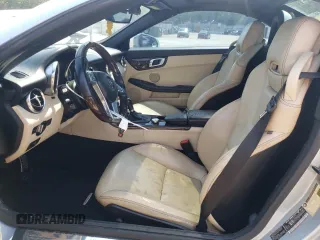 2014 Mercedes-Benz SLK 250 with VIN WDDPK4HA6EF077432, listed as a Copart auction lot 58894045 with 112,551 mi miles and Salvage title. Bid and sale history available at DreamBid. Image 7.