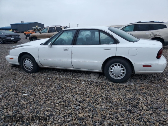 1998 Oldsmobile 88 LS z VIN 1G3HN52K8W4865297, wystawiony jako Copart lot #78698224 z przebiegiem 271 468 mil mil oraz Szkoda całkowita • Salvage title. Historia ofert i sprzedaży dostępna na DreamBid. Obrazek 2.