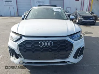 2022 Audi Q5 S line Premium z VIN WA1GAAFY3N2101201, wystawiony jako IAAI lot #41263245 z przebiegiem 28 361 mil mil oraz . Historia ofert i sprzedaży dostępna na DreamBid. Obrazek 11.