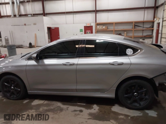 2015 Chrysler 200 Limited with VIN 1C3CCCAB2FN698701, listed as a IAAI auction lot 42073888 with 112,266 mi miles and . Bid and sale history available at DreamBid. Image 15.