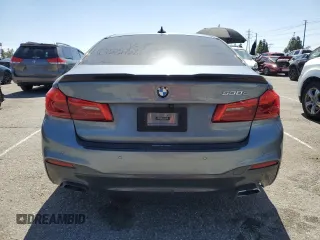 2020 BMW 5 Series 530e with VIN WBAJA9C06LCE66990, listed as a Copart auction lot 48823925 with 57,673 mi miles and Salvage Title. Bid and sale history available at DreamBid. Image 6.