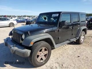 2014 Jeep Wrangler Unlimited Sport with VIN 1C4BJWDG3EL121188, listed as a Copart auction lot 84026964 with 157,092 mi miles and Clean title. Bid and sale history available at DreamBid. Image 1.