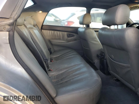 2000 Mitsubishi Diamante LS z VIN 6MMAP67P5YT006608, wystawiony jako Copart lot #49009455 z przebiegiem 241 503 mil mil oraz Tytuł czysty. Historia ofert i sprzedaży dostępna na DreamBid. Obrazek 10.