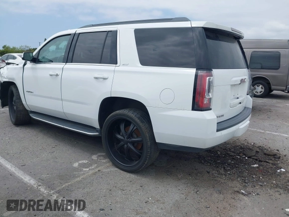 2017 GMC Yukon SLT with VIN 1GKS2BKC9HR125757, listed as a IAAI auction lot 42034182 with 72,333 mi miles. Bid and sale history available at carsss.com. Image 3.