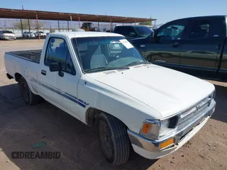 1994 Toyota Pickup DLX z VIN 4TARN81P3RZ158100, wystawiony jako IAAI lot #41765563 z przebiegiem 172 526 mil mil oraz . Historia ofert i sprzedaży dostępna na DreamBid. Obrazek 1.