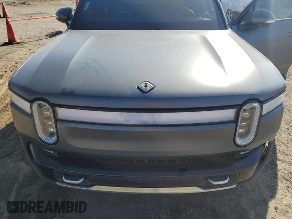2024 Rivian R1T Adventure with VIN 7FCTGBAA1RN032543, listed as a Copart auction lot 69800484 with Not Provided miles and Salvage Title. Bid and sale history available at carsss.com. Image 12.