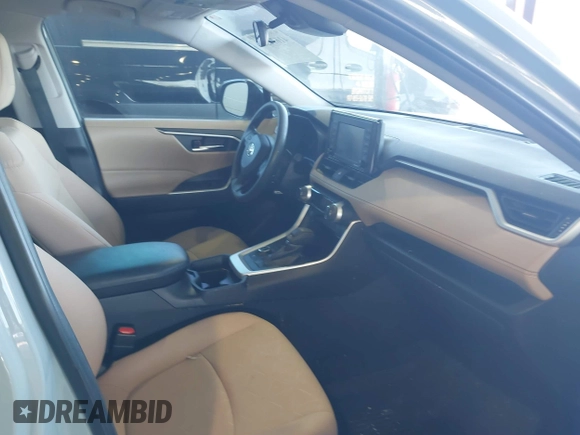 2020 Toyota RAV4 Hybrid XLE with VIN 2T3RWRFV0LW082793, listed as a IAAI auction lot 41674569 with 50,224 mi miles and . Bid and sale history available at DreamBid. Image 5.