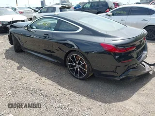 2019 BMW 8 Series M850i xDrive with VIN WBABC4C59KBU96788, listed as a IAAI auction lot 42286659 with 26,913 mi miles and . Bid and sale history available at DreamBid. Image 3.