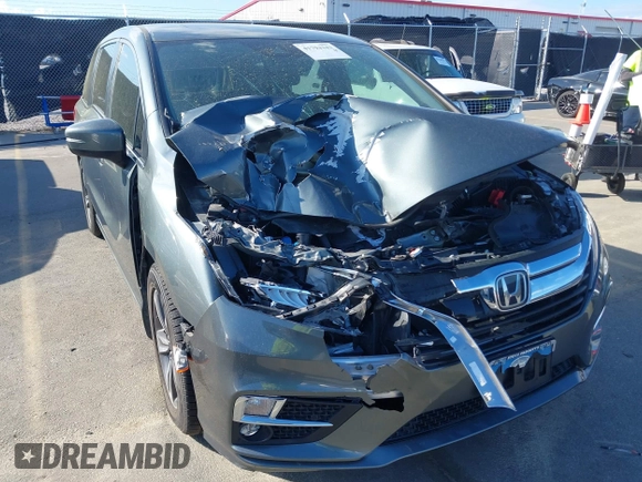 2020 Honda Odyssey Touring z VIN 5FNRL6H8XLB035047, wystawiony jako IAAI lot #41794343 z przebiegiem 57 537 mil mil oraz . Historia ofert i sprzedaży dostępna na DreamBid. Obrazek 6.