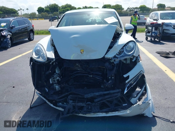 2014 Porsche Cayenne with VIN WP1AA2A20ELA02638, listed as a IAAI auction lot 42349570 with 113,355 mi miles and . Bid and sale history available at DreamBid. Image 12.