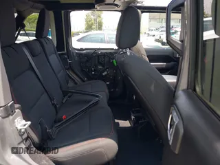 2020 Jeep Wrangler Unlimited Rubicon with VIN 1C4HJXFG3LW279636, listed as a IAAI auction lot 42430354 with 19,631 mi miles and . Bid and sale history available at DreamBid. Image 8.