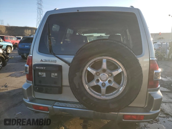 2001 Mitsubishi Montero Limited z VIN JA4MW51R41J037651, wystawiony jako Copart lot #43964815 z przebiegiem 155 578 mil mil oraz Tytuł czysty. Historia ofert i sprzedaży dostępna na DreamBid. Obrazek 6.