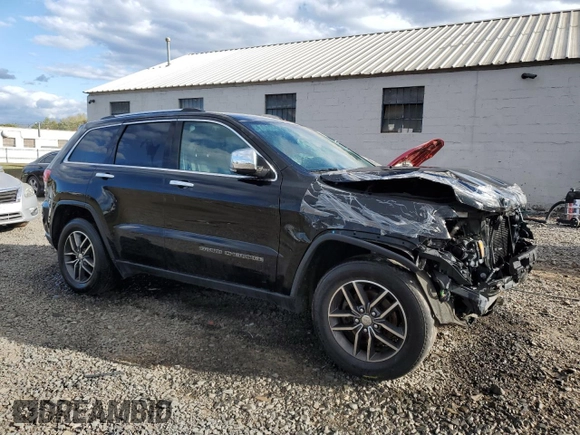 2017 Jeep Grand Cherokee Limited with VIN 1C4RJFBG3HC835019, listed as a Copart auction lot 74795804 with 104,999 mi miles and Salvage title. Bid and sale history available at DreamBid. Image 4.