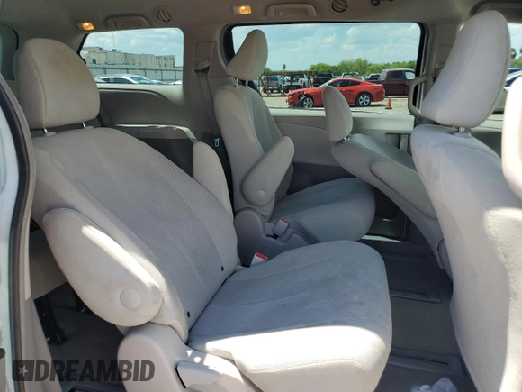 2014 Toyota Sienna L with VIN 5TDZK3DCXES463632, listed as a Copart auction lot 69957284 with 206,250 mi miles and Salvage Title. Bid and sale history available at carsss.com. Image 11.