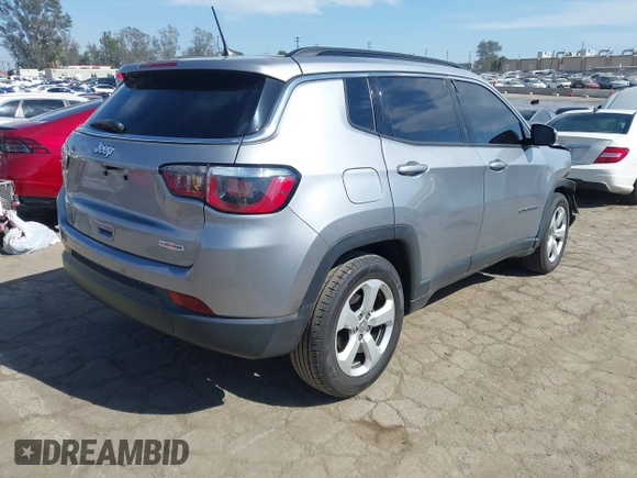 2019 Jeep Compass Latitude with VIN 3C4NJCBB0KT676974, listed as a IAAI auction lot 42020893 with 54,159 mi miles and . Bid and sale history available at DreamBid. Image 4.