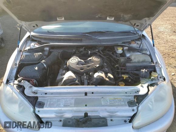 2004 Dodge Intrepid SE z VIN 2B3HD46R94H646497, wystawiony jako Copart lot #77386594 z przebiegiem 202 594 mil mil oraz Szkoda całkowita • Salvage title. Historia ofert i sprzedaży dostępna na DreamBid. Obrazek 11.