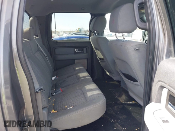 2013 Ford F-150 XL z VIN 1FTFW1EF8DKE23561, wystawiony jako IAAI lot #41747119 z przebiegiem 182 398 mil mil oraz . Historia ofert i sprzedaży dostępna na DreamBid. Obrazek 8.