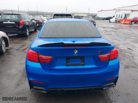 2015 BMW M4 with VIN WBS3U9C5XFJ968082, listed as a IAAI auction lot 41513593 with 57,715 mi miles. Bid and sale history available at carsss.com. Image 16.