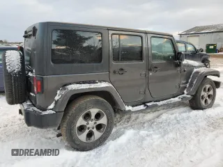 2017 Jeep Wrangler Unlimited 75th Anniversary z VIN 1C4BJWEG8HL585435, wystawiony jako Copart lot #82579554 z przebiegiem 124 840 mil mil oraz Czysty tytuł • Clean title. Historia ofert i sprzedaży dostępna na DreamBid. Obrazek 3.