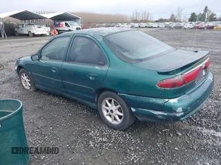 1999 Ford Contour SE Fleet with VIN 1FAFP66L3XK227522, listed as a IAAI auction lot 41702873 with 140,926 mi miles. Bid and sale history available at carsss.com. Image 3.