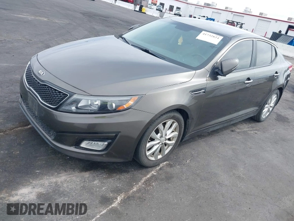 2014 Kia Optima EX with VIN 5XXGN4A79EG342071, listed as a IAAI auction lot 41732824 with Not Provided miles and . Bid and sale history available at carsss.com. Image 2.