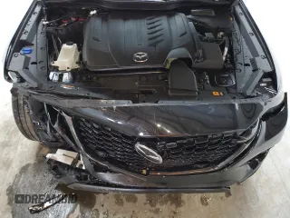 2025 Mazda CX-70 Preferred z VIN JM3KJBHDXS1115668, wystawiony jako Copart lot #80022374 z przebiegiem Nie podano mil oraz Tytuł czysty. Historia ofert i sprzedaży dostępna na DreamBid. Obrazek 12.