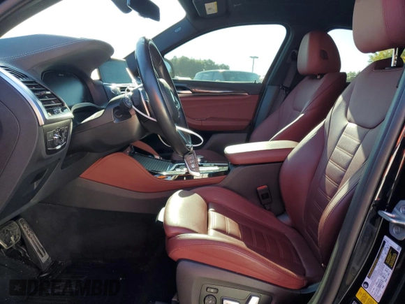 2021 BMW X4 M40i with VIN 5UX2V5C05M9H59295, listed as a Copart auction lot 71312963 with 31,050 mi miles. Bid and sale history available at carsss.com. Image 7.