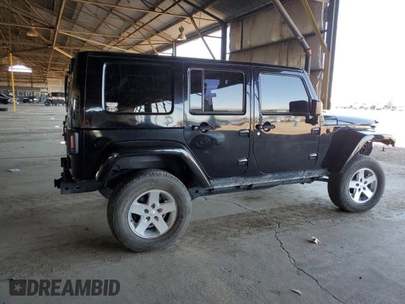 2008 Jeep Wrangler Unlimited Sahara with VIN 1J4GA59108L521910, listed as a Copart auction lot 62330425 with 169,887 mi miles and Salvage title. Bid and sale history available at DreamBid. Image 3.