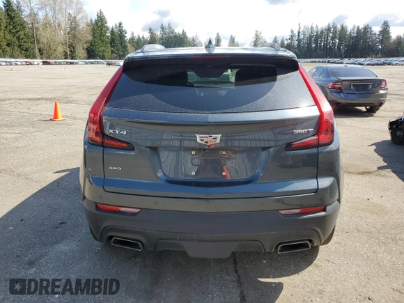 2021 Cadillac XT4 AWD Luxury with VIN 1GYFZBR48MF034573, listed as a Copart auction lot 51114315 with 53,066 mi miles and Salvage title. Bid and sale history available at DreamBid. Image 6.