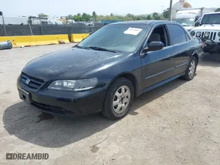 2002 Honda Accord Sdn SE with VIN 1HGCG66802A130514, listed as a IAAI auction lot 42053889 with 326,434 mi miles. Bid and sale history available at carsss.com. Image 2.