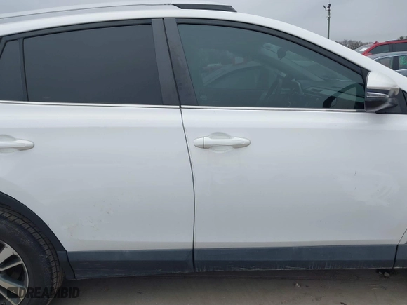 2016 Toyota RAV4 XLE with VIN 2T3WFREV8GW259777, listed as a IAAI auction lot 41241266 with 129,122 mi miles. Bid and sale history available at carsss.com. Image 13.