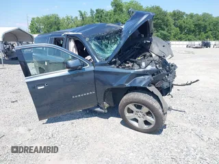 2020 Chevrolet Suburban LT with VIN 1GNSKHKC1LR101094, listed as a IAAI auction lot 42245069 with 100,000 mi miles and . Bid and sale history available at DreamBid. Image 1.