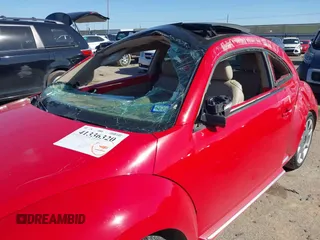 2013 Volkswagen Beetle 2.5L w/Sun/Sound/Nav with VIN 3VWJX7AT0DM673162, listed as a IAAI auction lot 41336320 with Not Provided miles and . Bid and sale history available at DreamBid. Image 6.