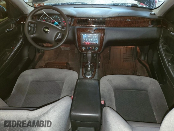 2015 Chevrolet Impala LS with VIN 2G1WA5E36F1171137, listed as a Copart auction lot 63060935 with 148,000 mi miles and Salvage title. Bid and sale history available at DreamBid. Image 8.