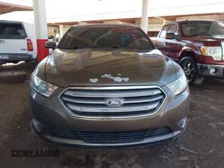 2015 Ford Taurus SEL with VIN 1FAHP2H87FG176103, listed as a IAAI auction lot 41950844 with 205,014 mi miles. Bid and sale history available at carsss.com. Image 12.