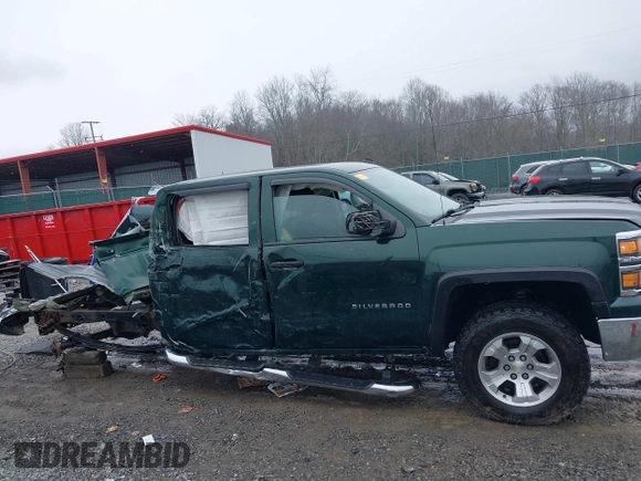 2014 Chevrolet Silverado 1500 LT with VIN 3GCUKREC1EG516826, listed as a IAAI auction lot 41119573 with 164,844 mi miles and . Bid and sale history available at DreamBid. Image 14.