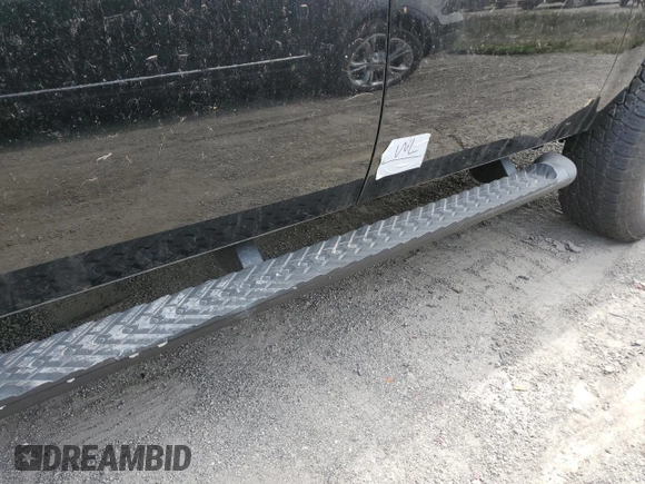 2013 Chevrolet Suburban with VIN 1GNWKMEG4DR257785, listed as a Copart auction lot 76817344 with 68,021 mi miles and Salvage title. Bid and sale history available at DreamBid. Image 13.
