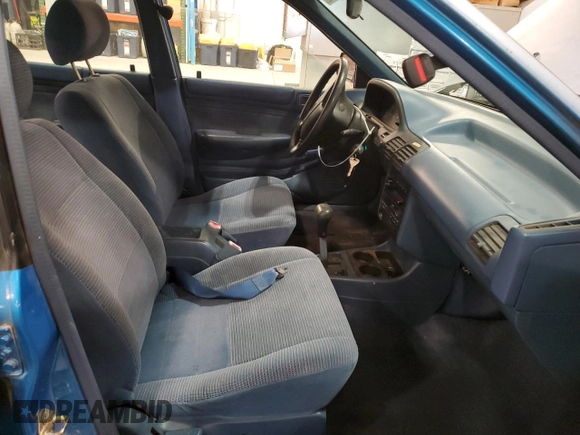 1994 Ford Escort z VIN 1FARP14J9RW318226, wystawiony jako Copart lot #60507135 z przebiegiem 69 041 mil mil oraz Szkoda całkowita • Salvage title. Historia ofert i sprzedaży dostępna na DreamBid. Obrazek 7.
