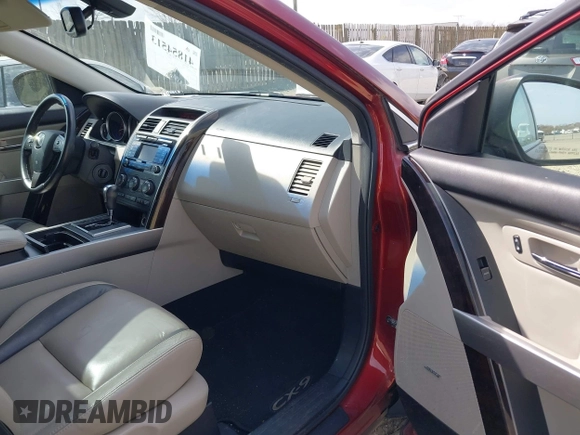 2012 Mazda CX-9 Grand Touring z VIN JM3TB3DV0C0340646, wystawiony jako IAAI lot #41854513 z przebiegiem 179 180 mil mil oraz . Historia ofert i sprzedaży dostępna na DreamBid. Obrazek 5.